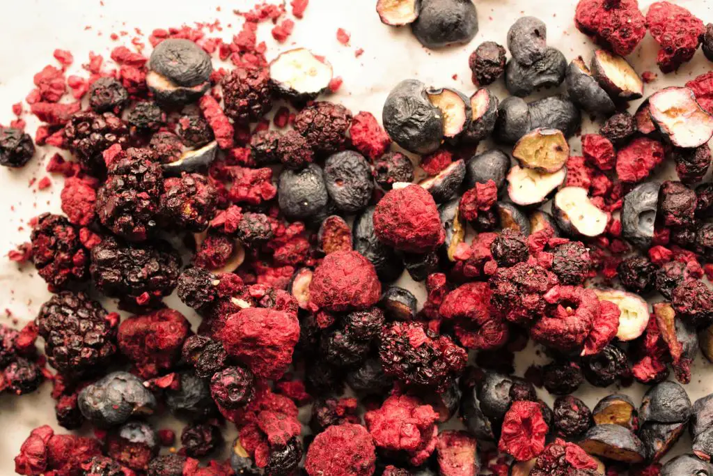 Freeze dried berries on a counter-top surface..